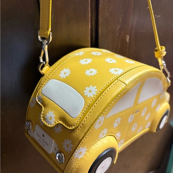 kate spade Handbags - Kate Spade Yellow and White Car-Shaped Bag